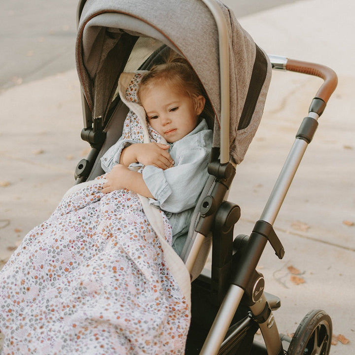 Little Unicorn Pressed Petals Muslin Baby Quilt model