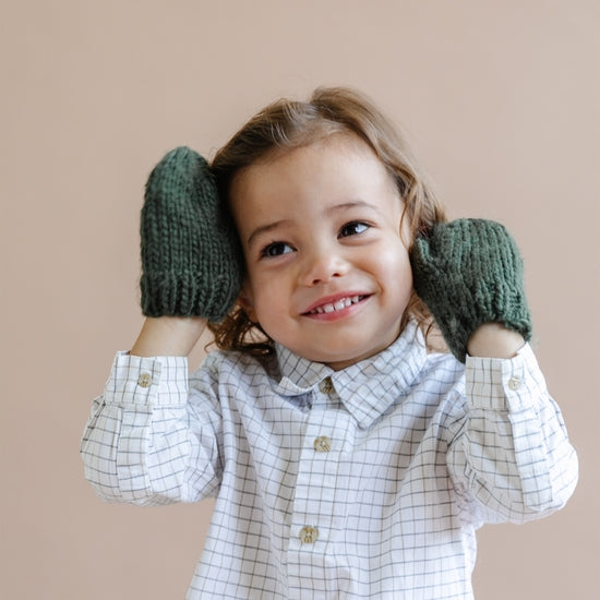 The Blueberry Hill Classic Hand Knit Mittens in Olive hand model