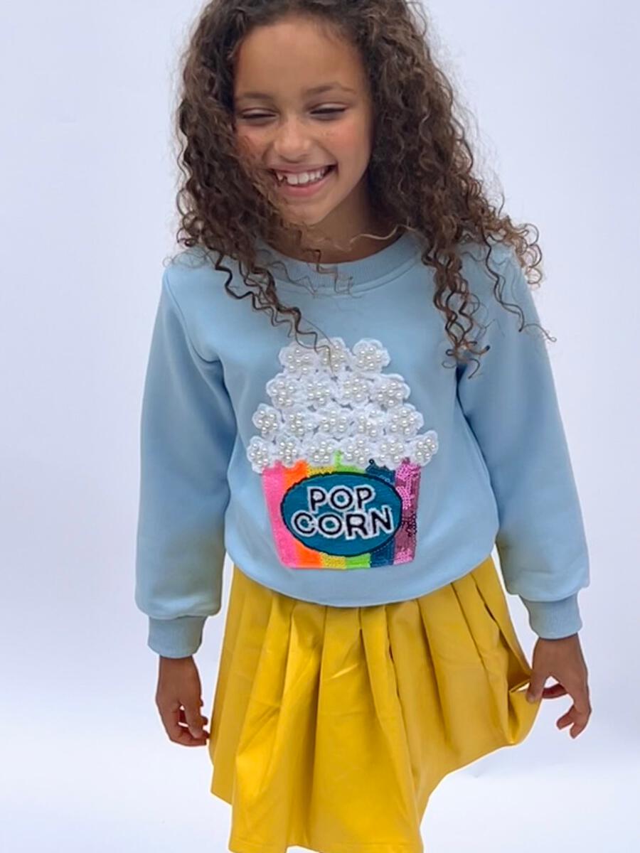 Lola + The Boys Pearls and Popcorn Sweatshirt model close