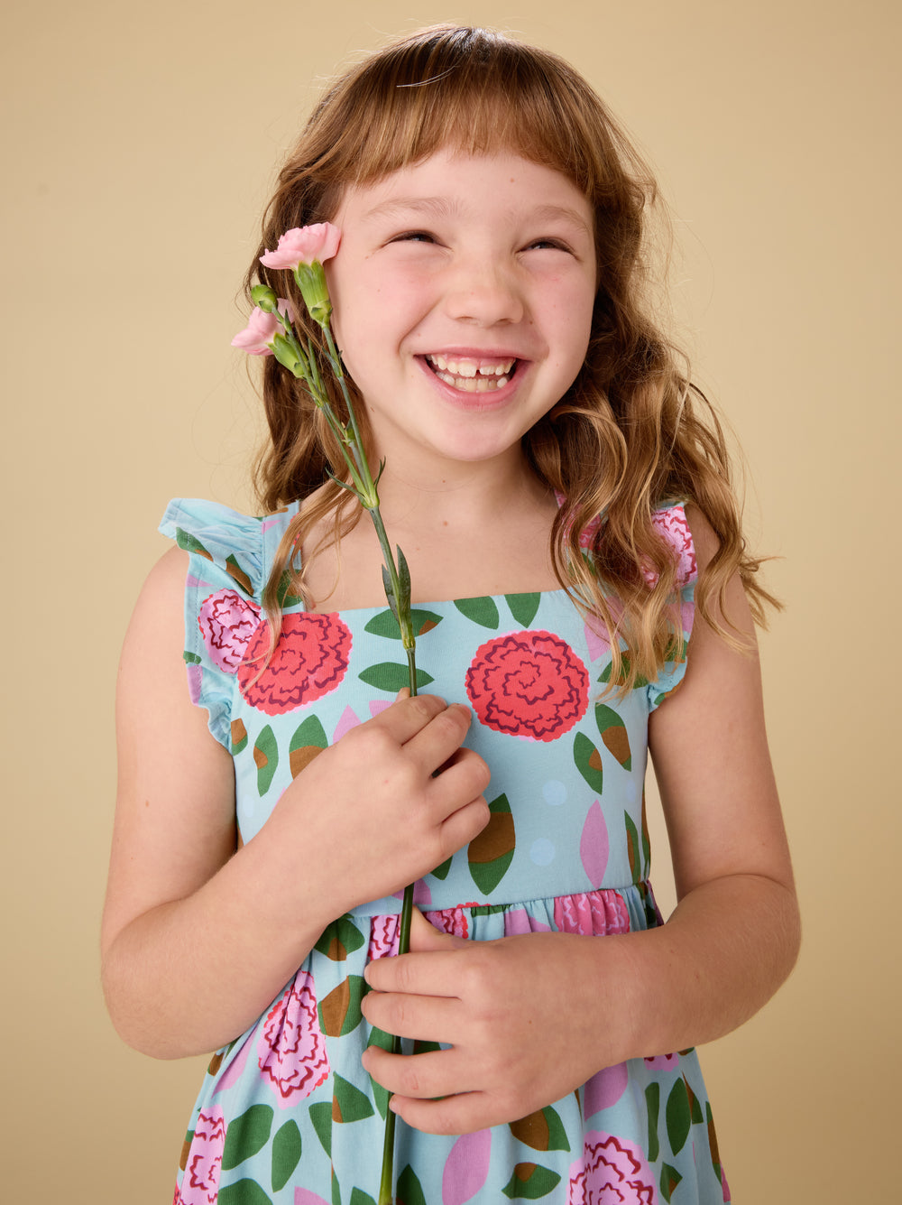 Tea Collection Spinning Carnations Ruffle Strap Dress model smile