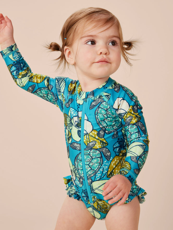 Tea Collection Turtle Floral Baby Rash Guard Swimsuit model