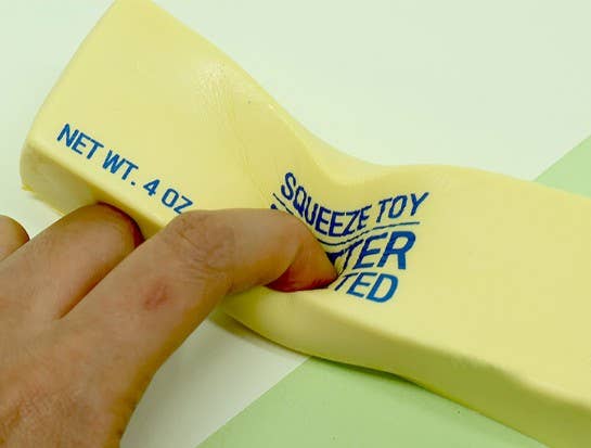 Butter Squishy Toy squeezed