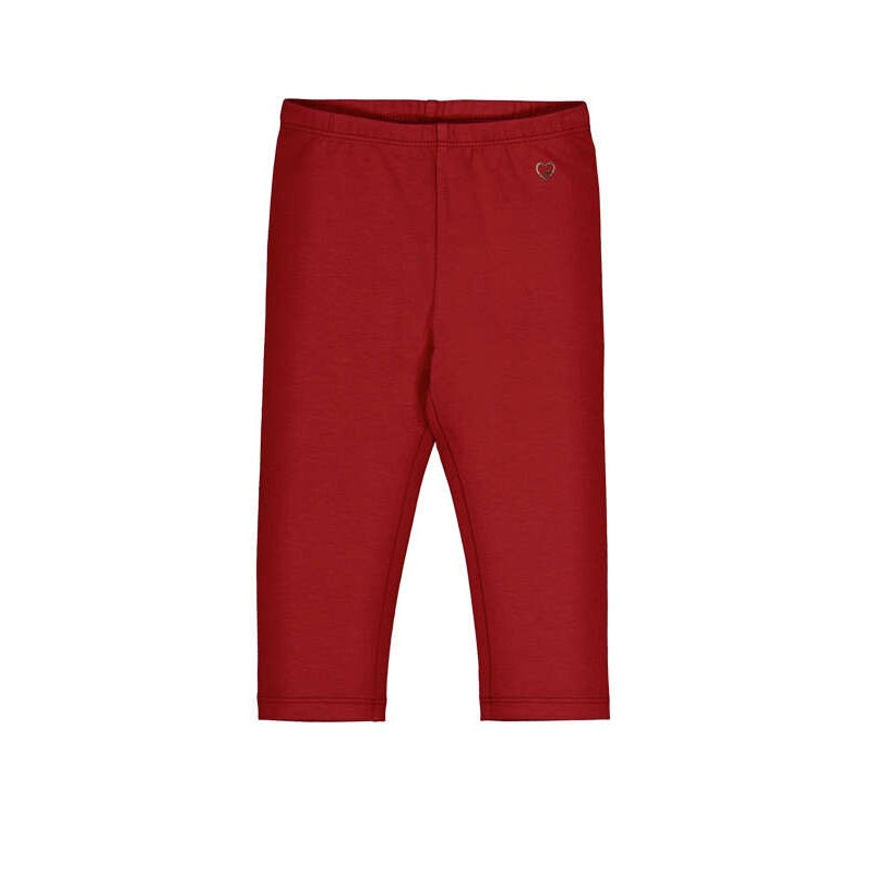 A pair of children's red knit capri pants with an elastic waistband and a small embroidered heart logo on the left hip, shown against a plain white background.
