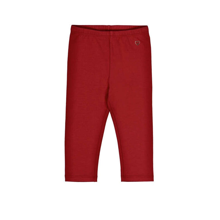 A pair of children's red knit capri pants with an elastic waistband and a small embroidered heart logo on the left hip, shown against a plain white background.