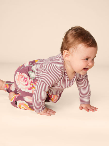 Tea Collection Turkish Rose Print Mix Romper model crawling