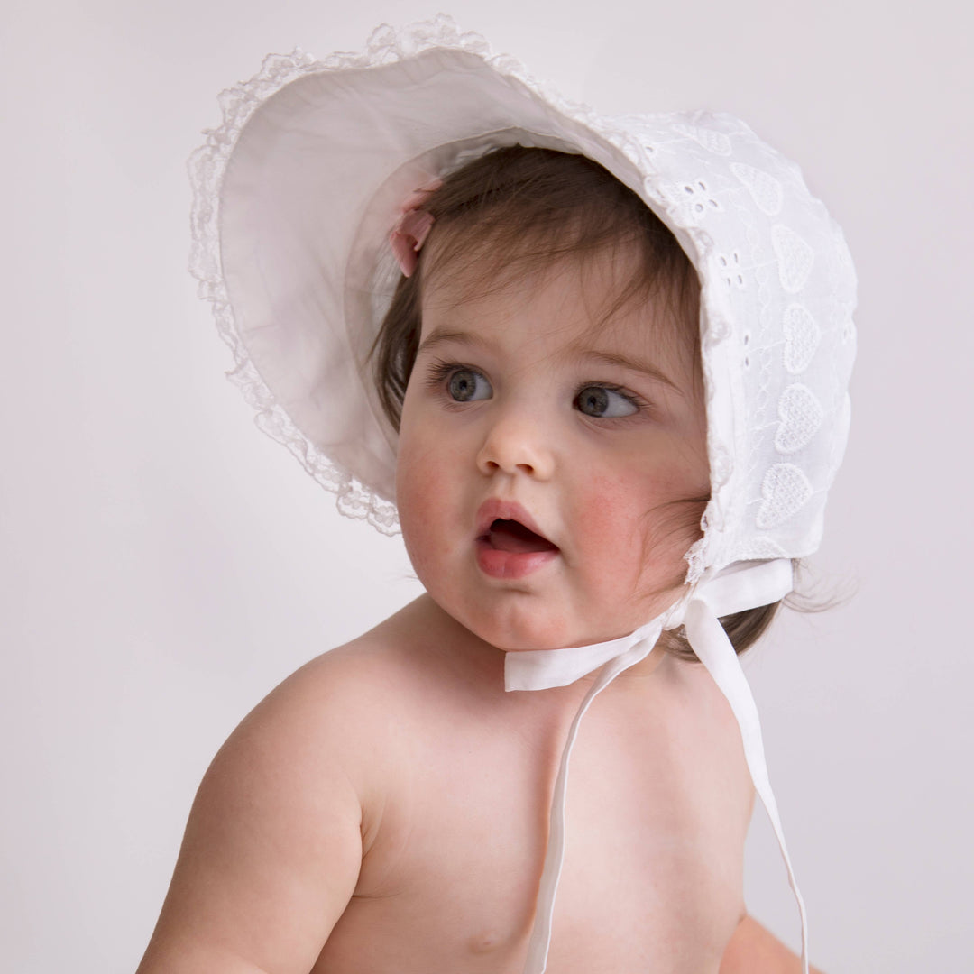 Huggalugs Heart Eyelet Baby Bonnet model