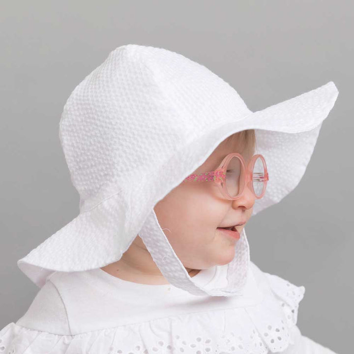 Huggalugs White Seersucker Sunhat model glasses