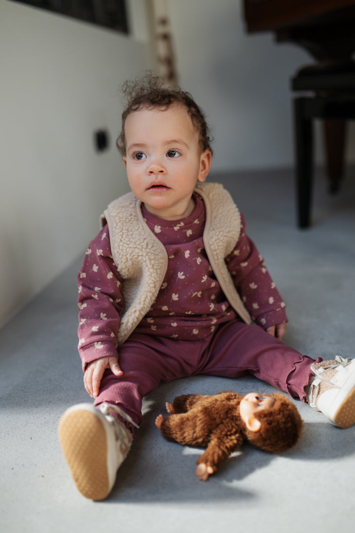 Babyface Teddy Berber Vest model seating