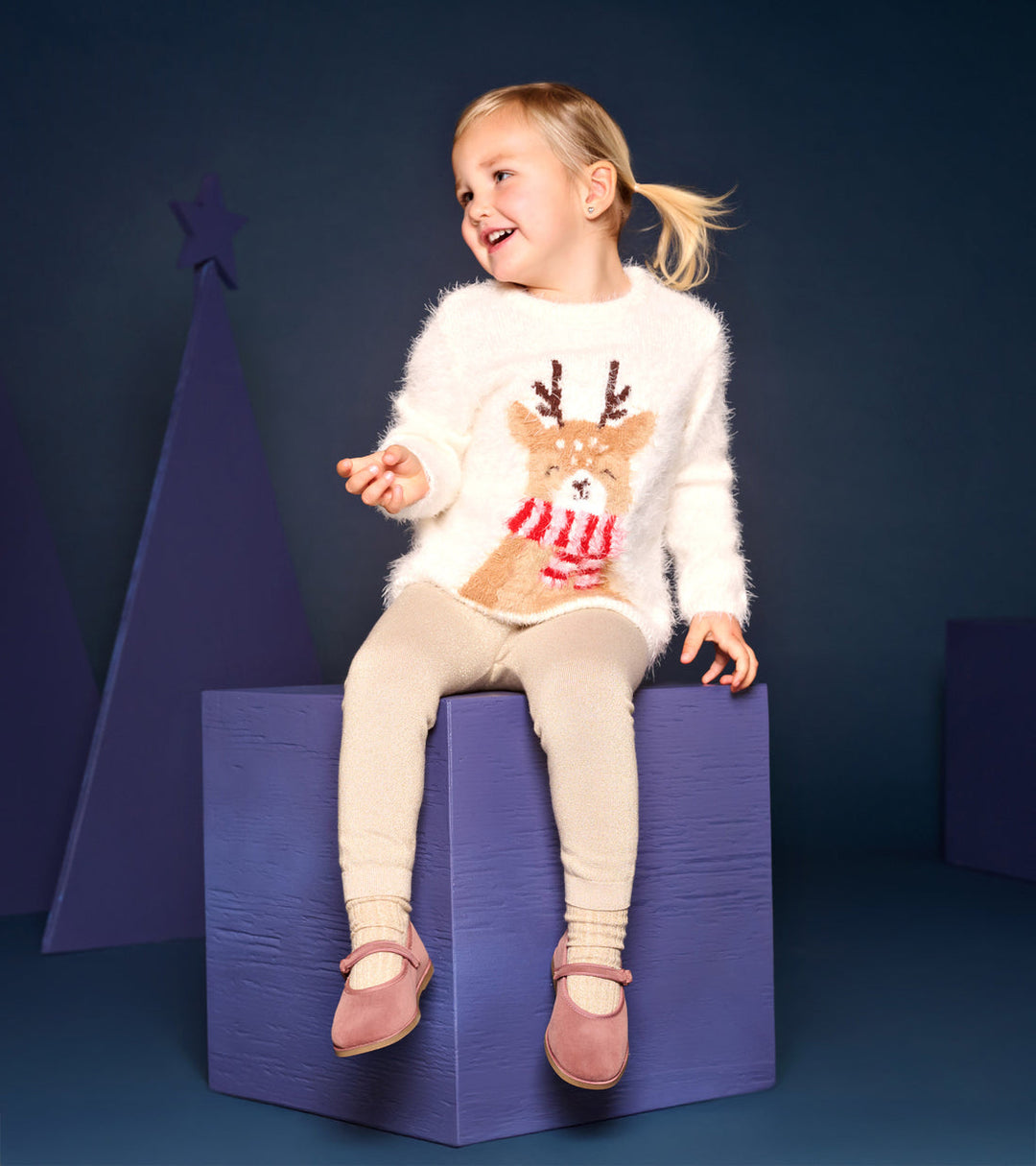 Hatley Reindeer Furry Sweater model seating