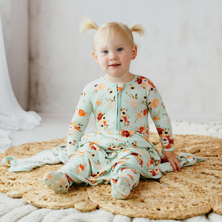 Kickee Pants Fall Floral Ruffle Footie model