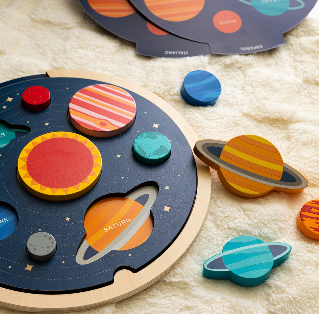 Petit Collage Wooden Solar System Puzzle on table