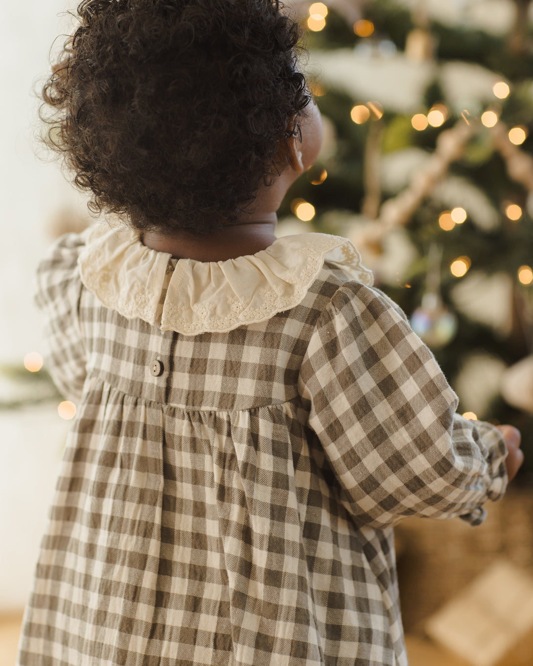 Quincy Mae Forest Check Callie Dress model tree