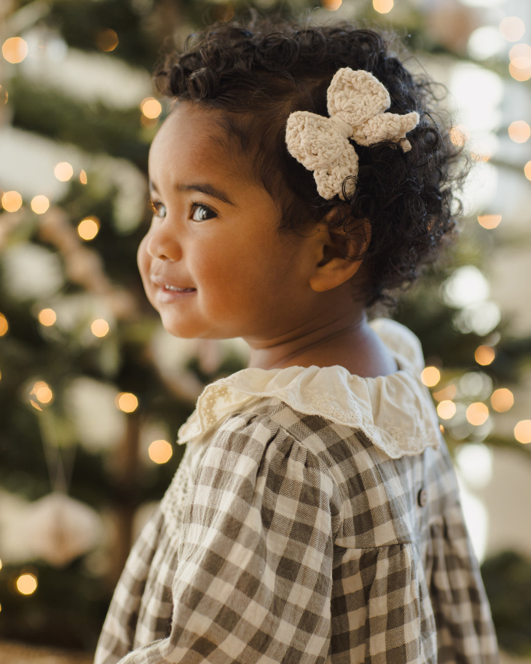 Quincy Mae Forest Check Callie Dress model face