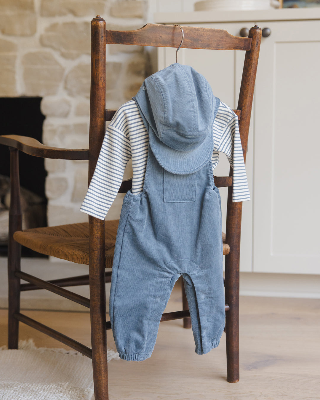 Quincy Mae Ocean Overalls hanging