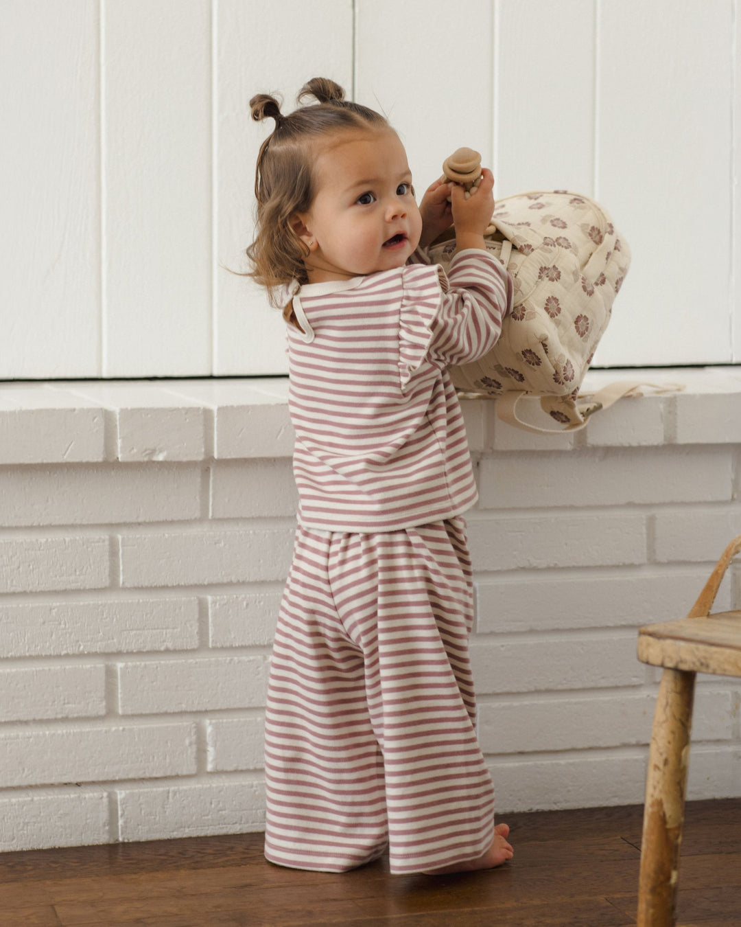 Quincy Mae Mulberry Stripe Cozy Baby Set model backpack