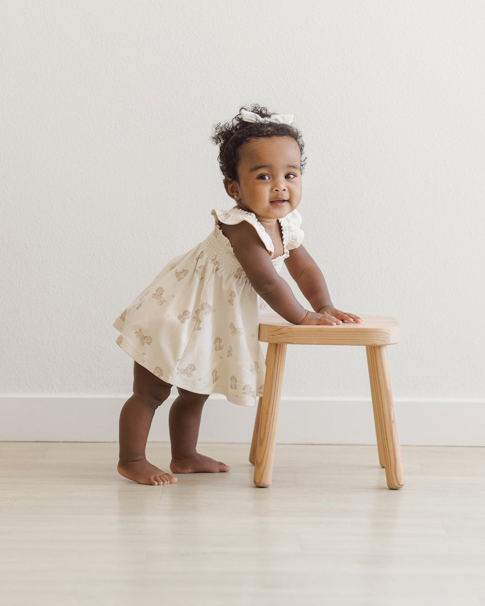 Quincy Mae Puppies Smocked Dress model