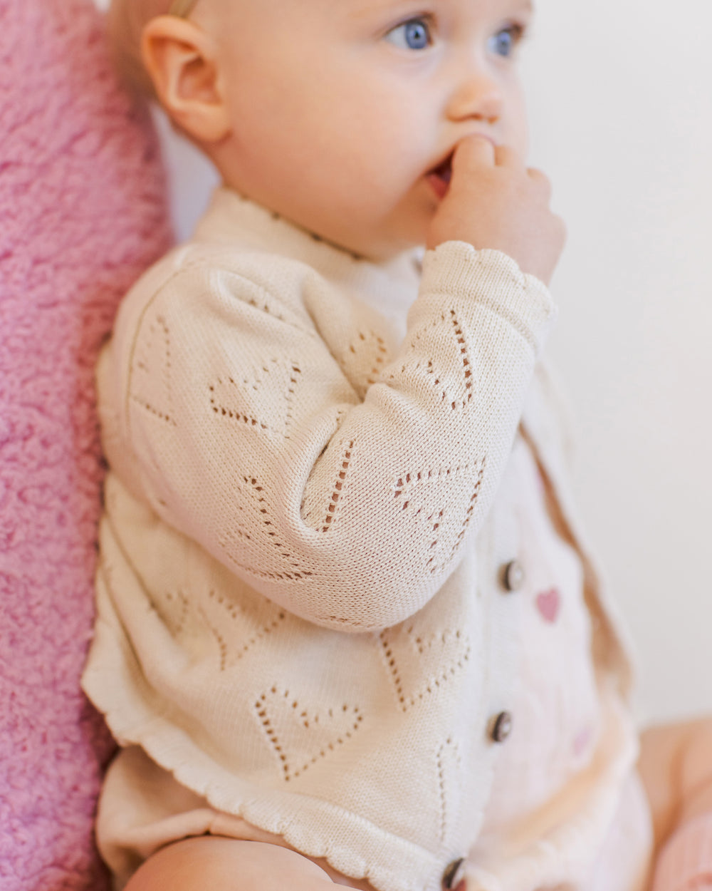 Quincy Mae Hearts Knit Cardigan model