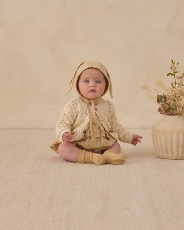 Quincy Mae Natural Knit Baby Cardigan model
