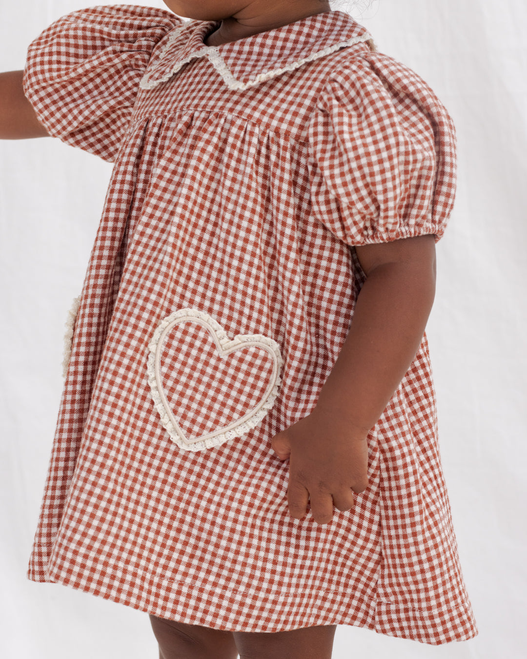 Quincy Mae Coraline Red Gingham Dress model close