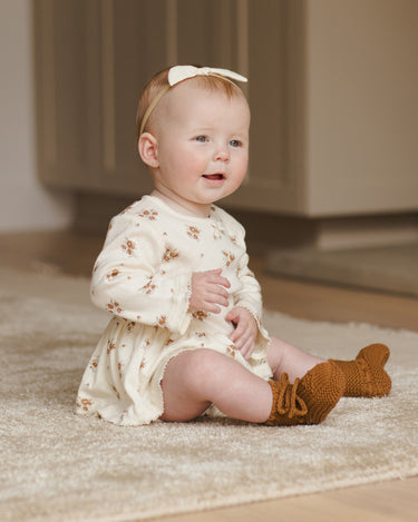 Quincy Mae Autumn Floral Skirted Bodysuit model