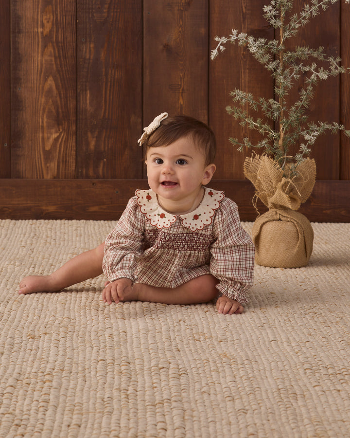 Quincy Mae Callie Christmas Plaid Dress model floor