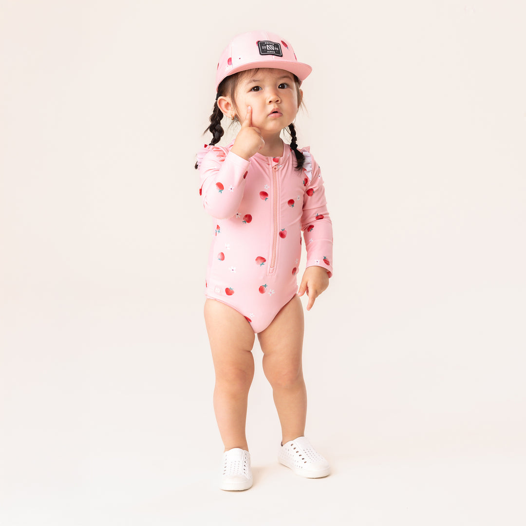 Noruk Strawberries Rash Guard model with hat