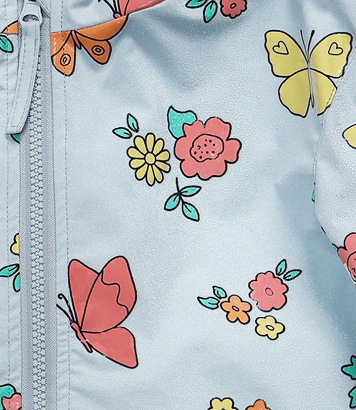 Holly & Beau Flower and Butterfly Color Changing Raincoat close wet