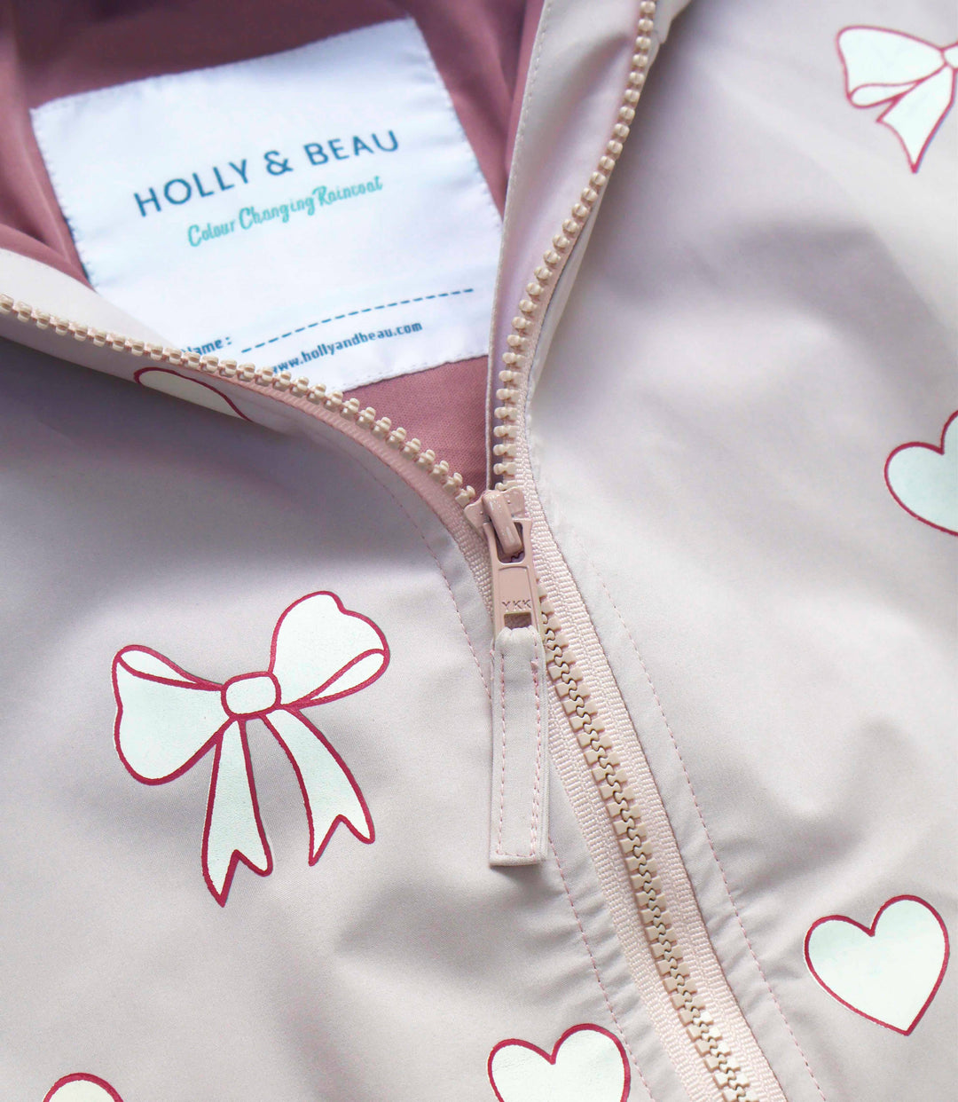 Holly & Beau Hearts & Bows Color Changing Raincoat zipper