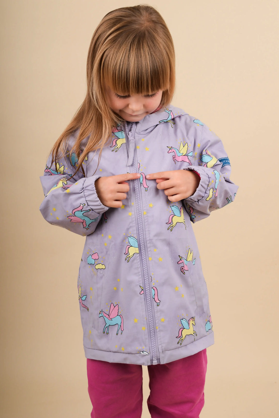 Holly & Beau Unicorn Color Changing Kids Raincoat model wet