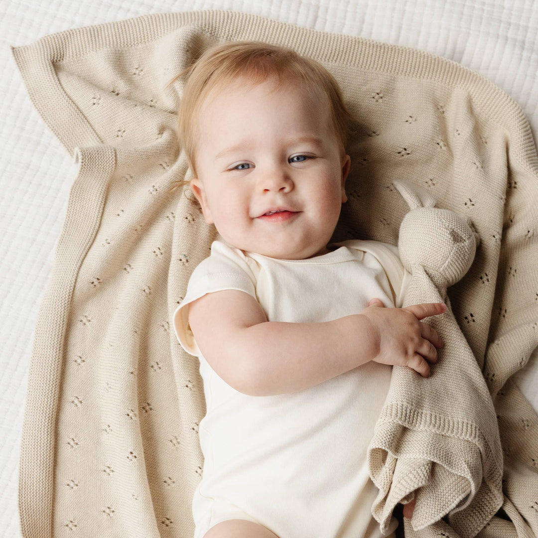 The Blueberry Hill Heirloom Birch Pique Organic Blanket model