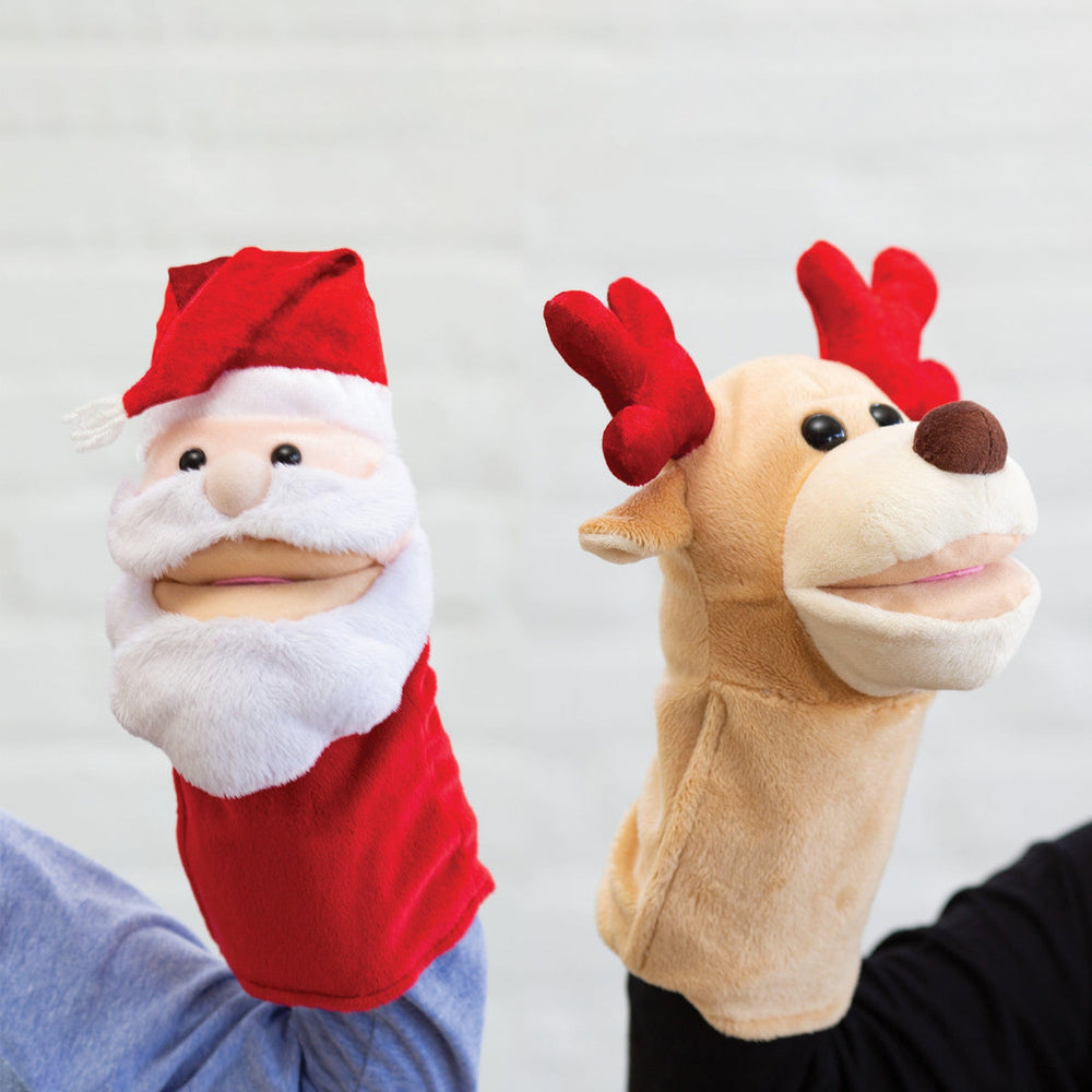 Singing North Pole Friends Hand Puppets in hands