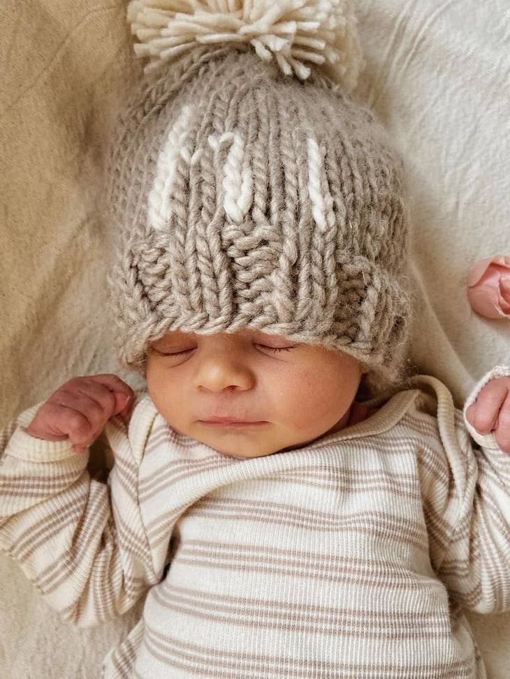 Huggalugs Hi Beanie in Pebble Brown model asleep