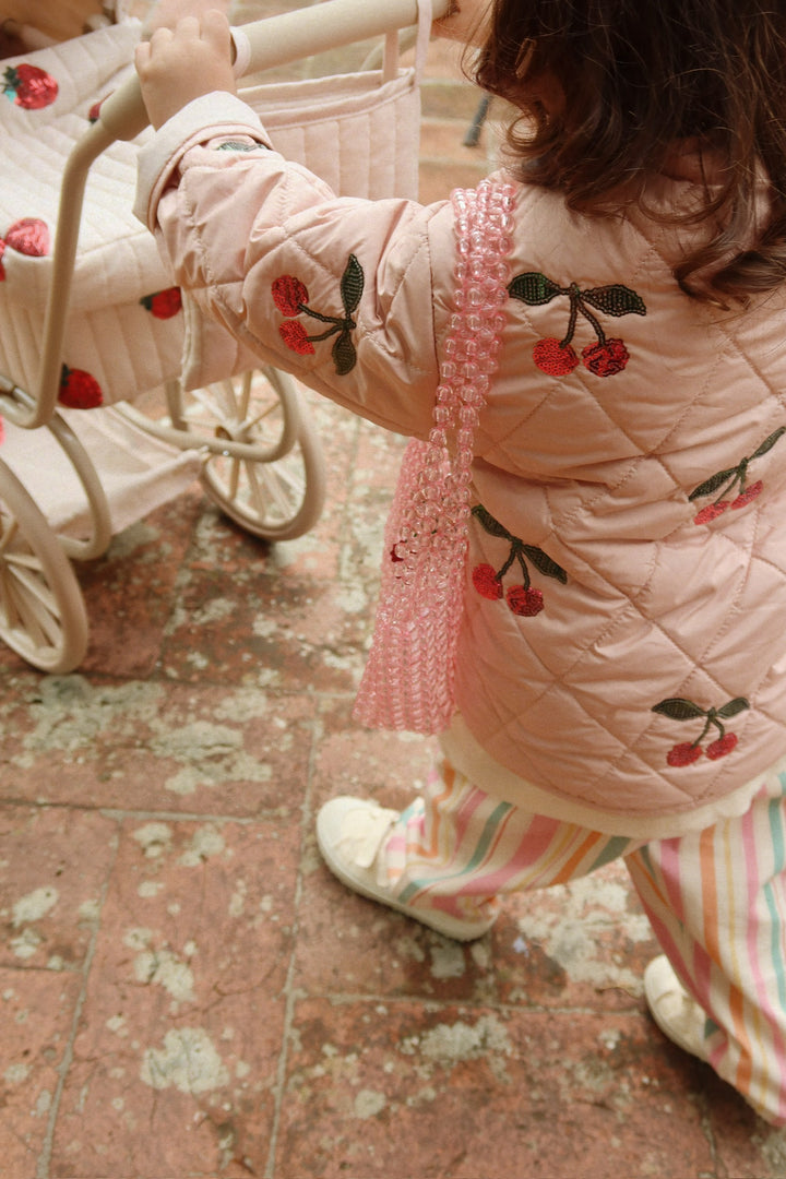 Konges Slojd Flora Cherry Sequin Jacket model stroller