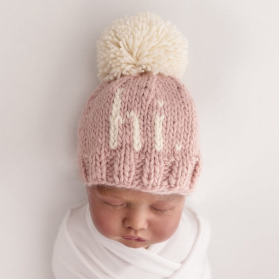 Huggalugs Hi Beanie in Rosy model head 